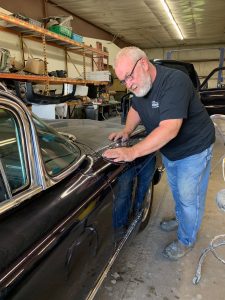 Joe sanding classic car